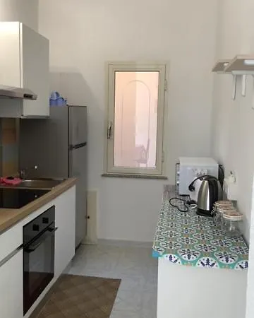 Апартаменты Benitike House Кала-Гононе