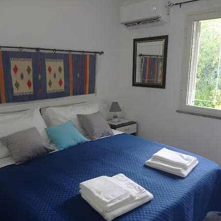 Апартаменты Benitike House Кала-Гононе